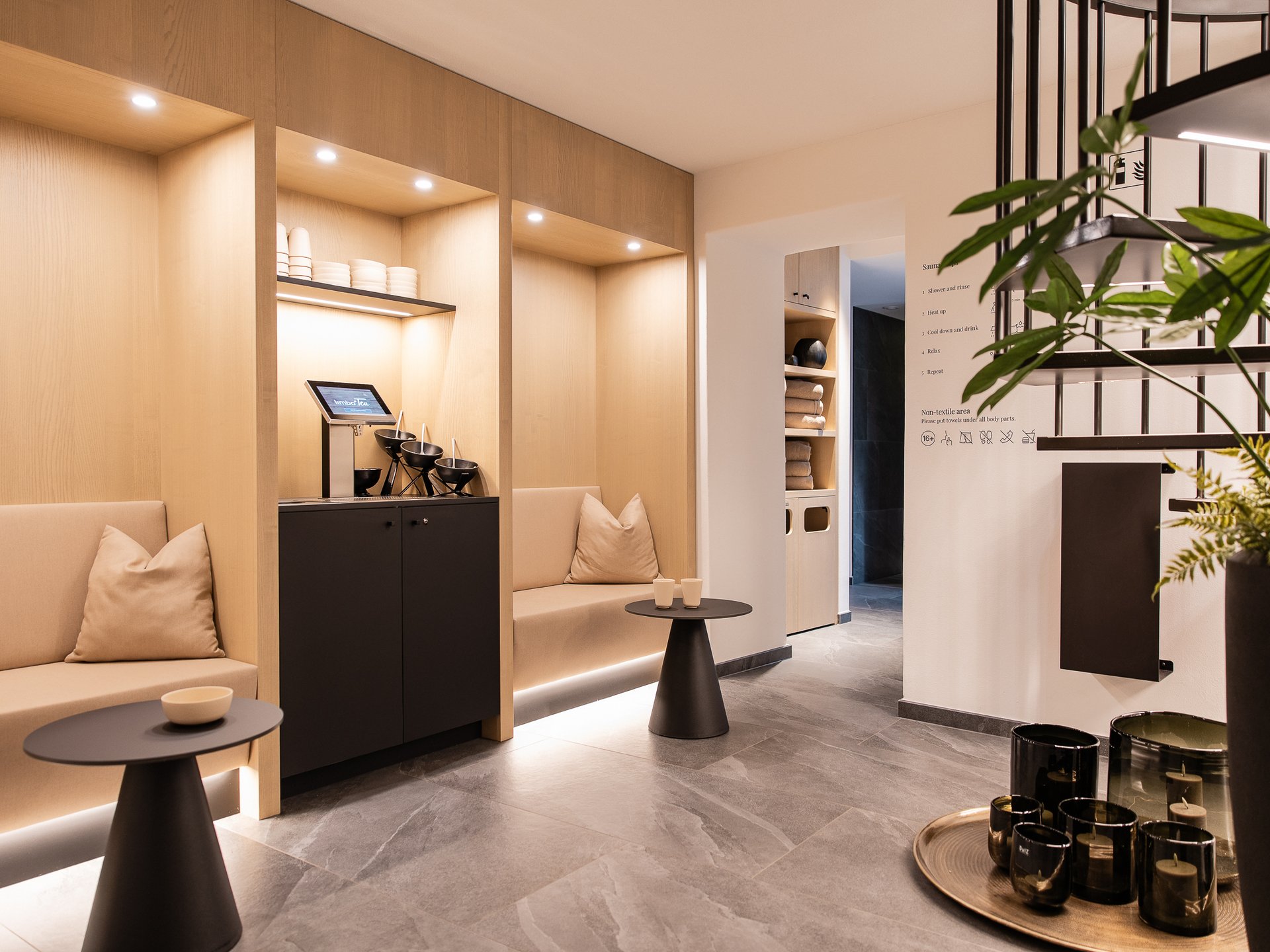 Modern waiting room with beige benches and decorative items